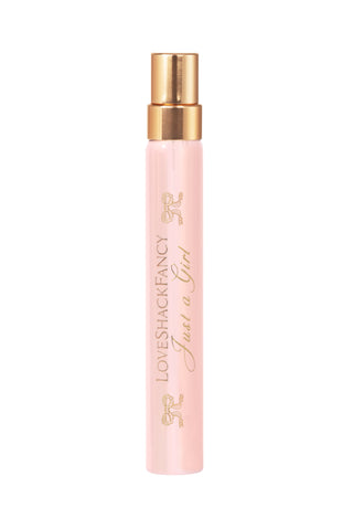 Single pink perfume travel spray bottle with gold mist sprayer, gold-tone top.
