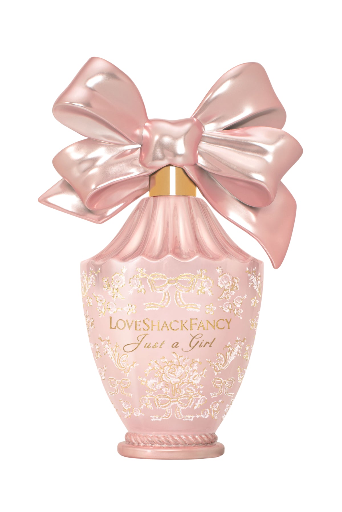 Pink bow perfume bottle with ornate gold label and LoveShackFancy style writing