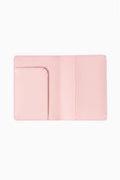 Blush pink open travel case with stitched edges and left compartment pocket