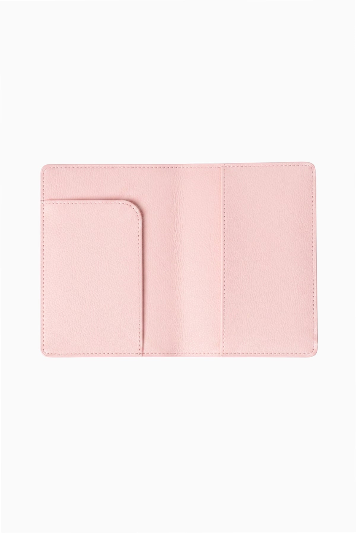 Blush pink open travel case with stitched edges and left compartment pocket