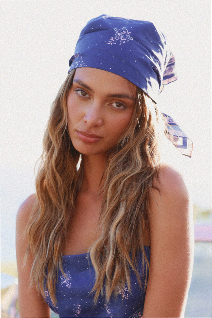 Floral and paisley head scarf in midnight blue, wrapped turban style