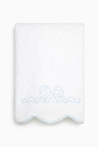 White bath towel with light-blue bow embroidery and scalloped bottom edge