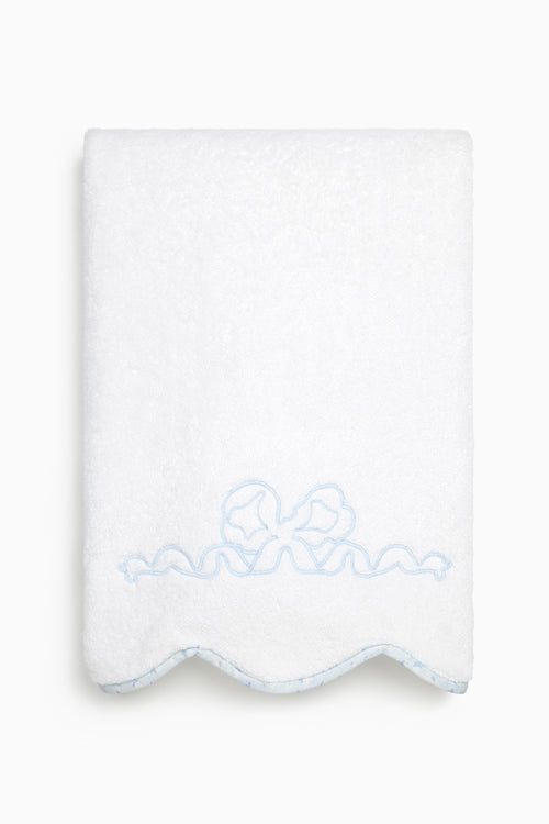 White bath towel with light-blue bow embroidery and scalloped bottom edge