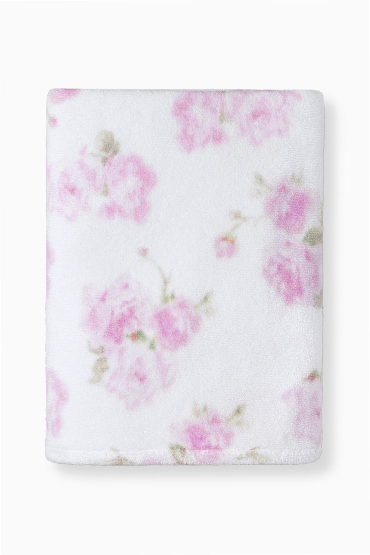 White bath towel with scattered pink floral pattern