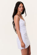 Rose drift eyelet linen mini dress, side view, thin straps and scalloped hem