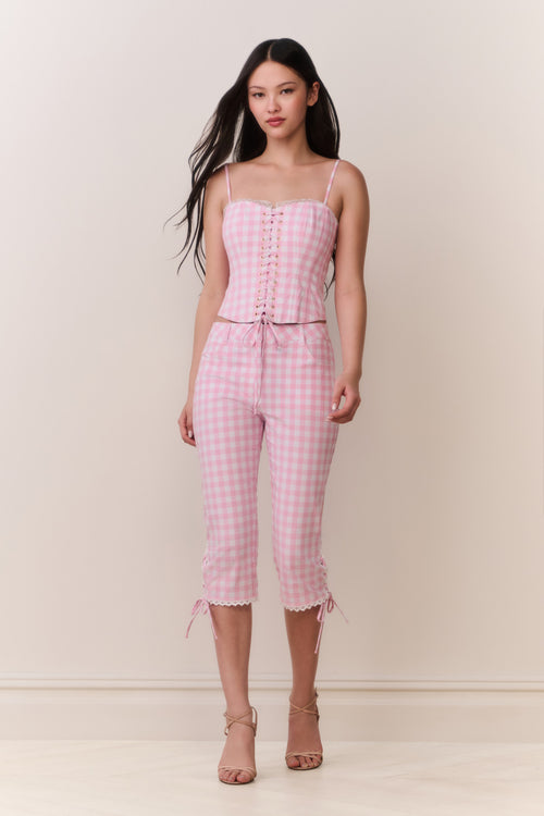 Pink gingham capri pants with adjustable waist, button front, and lace-tie cuffs