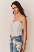 Cotton lace-up bustier with spaghetti straps and vertical light blue stripe pattern