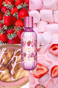 Berry Kiss perfume mist bottle, pink with strawberry print and purple cap