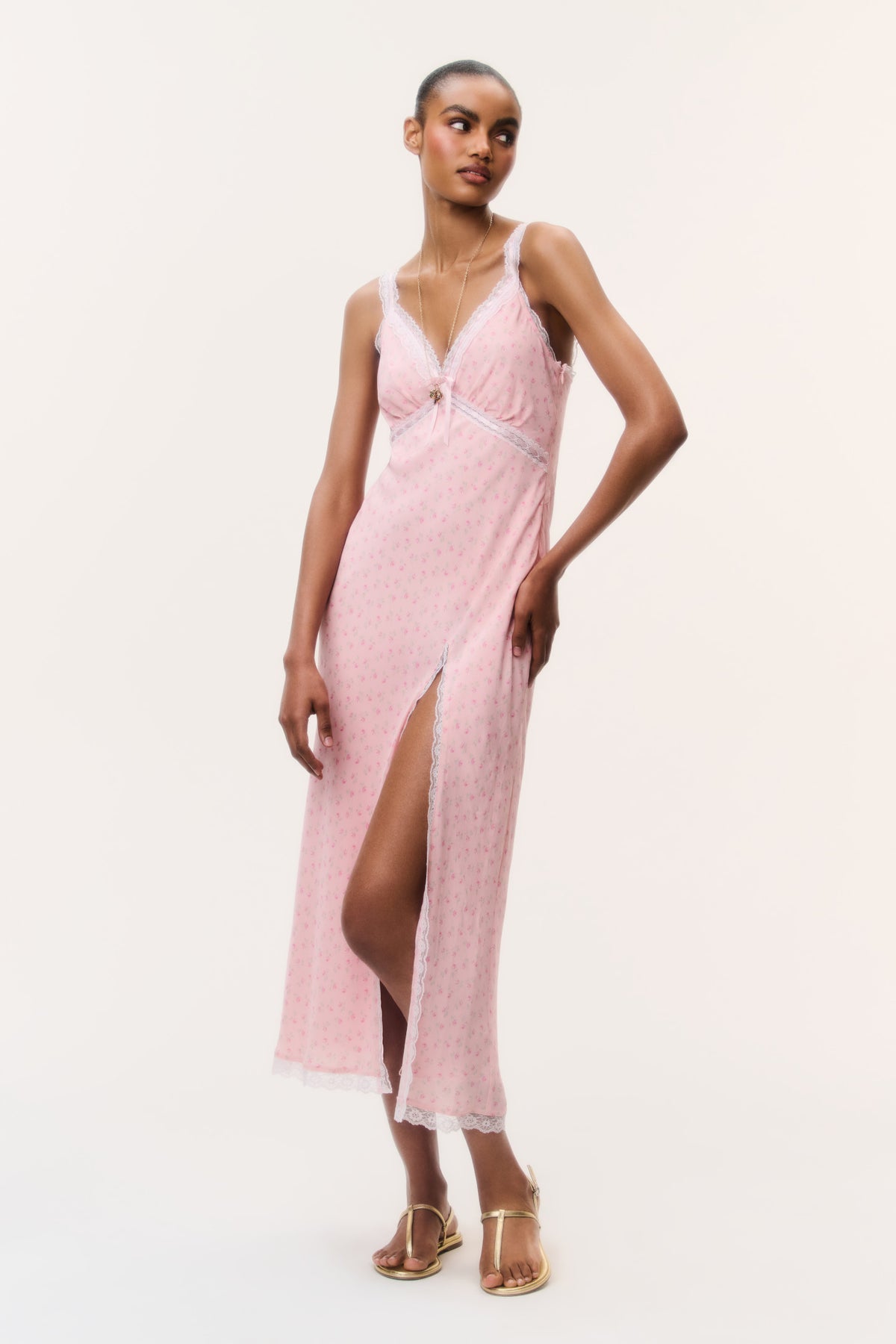 Pink floral maxi dress with V-neck, spaghetti straps, front slit and lace-trim hem