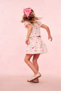 Girls pink tiered ruffle skirt with heart and kiss print, full skirt