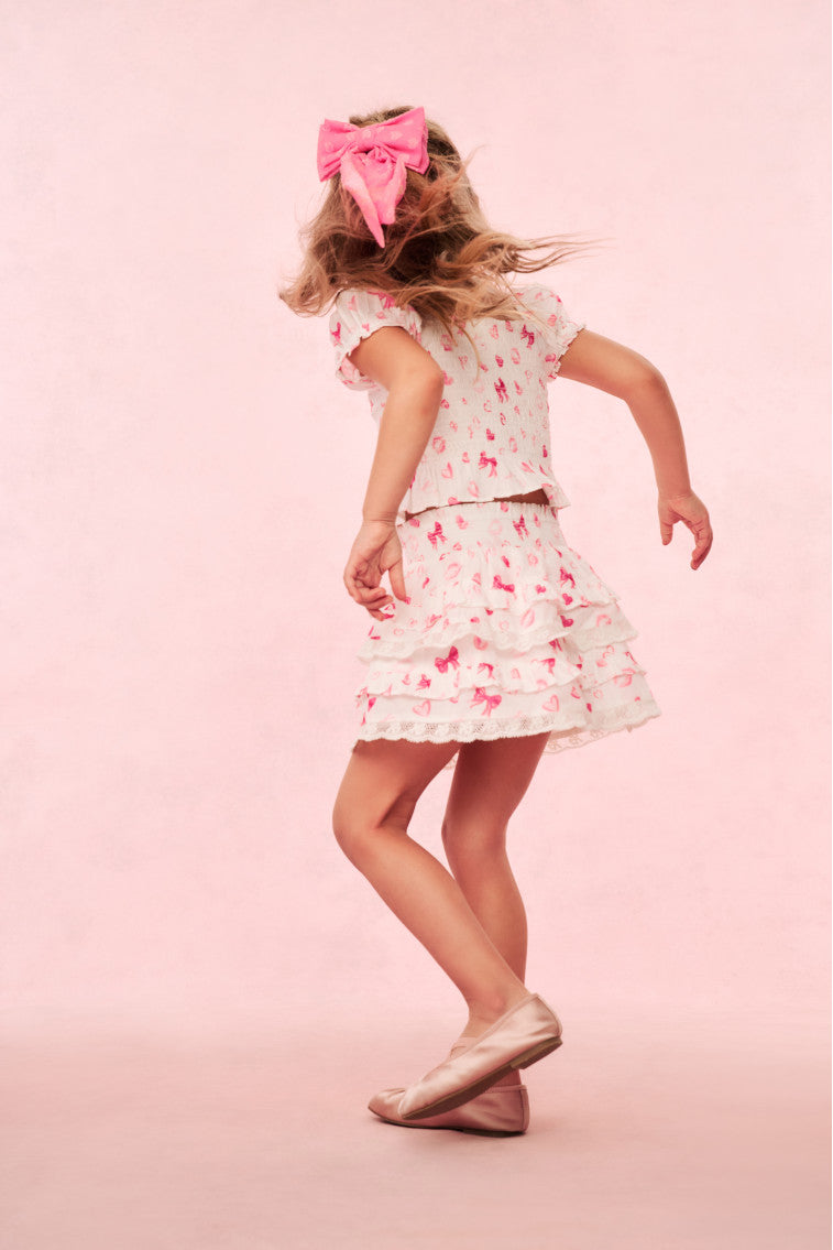 Girls pink tiered ruffle skirt with heart and kiss print, full skirt