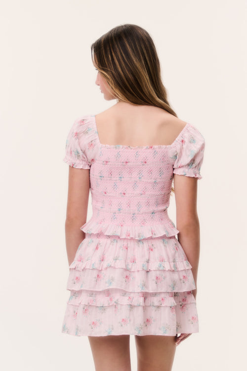 Tween rose-pink tiered ruffle top, back view with puff sleeves