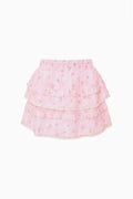 Pink ditsy floral tiered ruffle skirt with elastic waist and scalloped edges