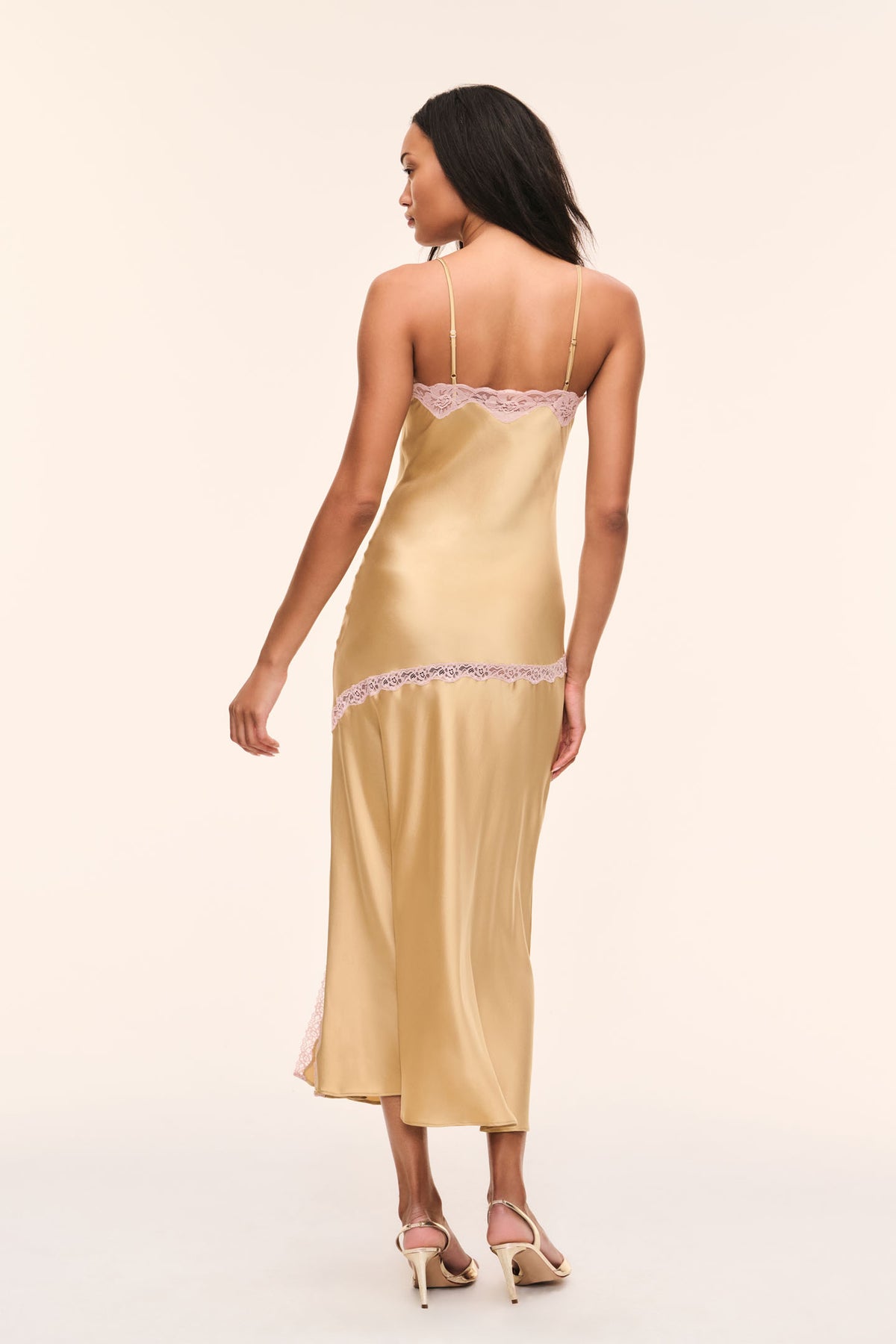Gold satin slip dress with lilac lace trim and thin straps, back view