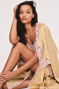 Light gold satin slip dress with lilac lace trim detail and thin straps
