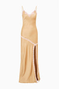 Light gold satin slip dress with lilac lace trim and thigh-high side slit
