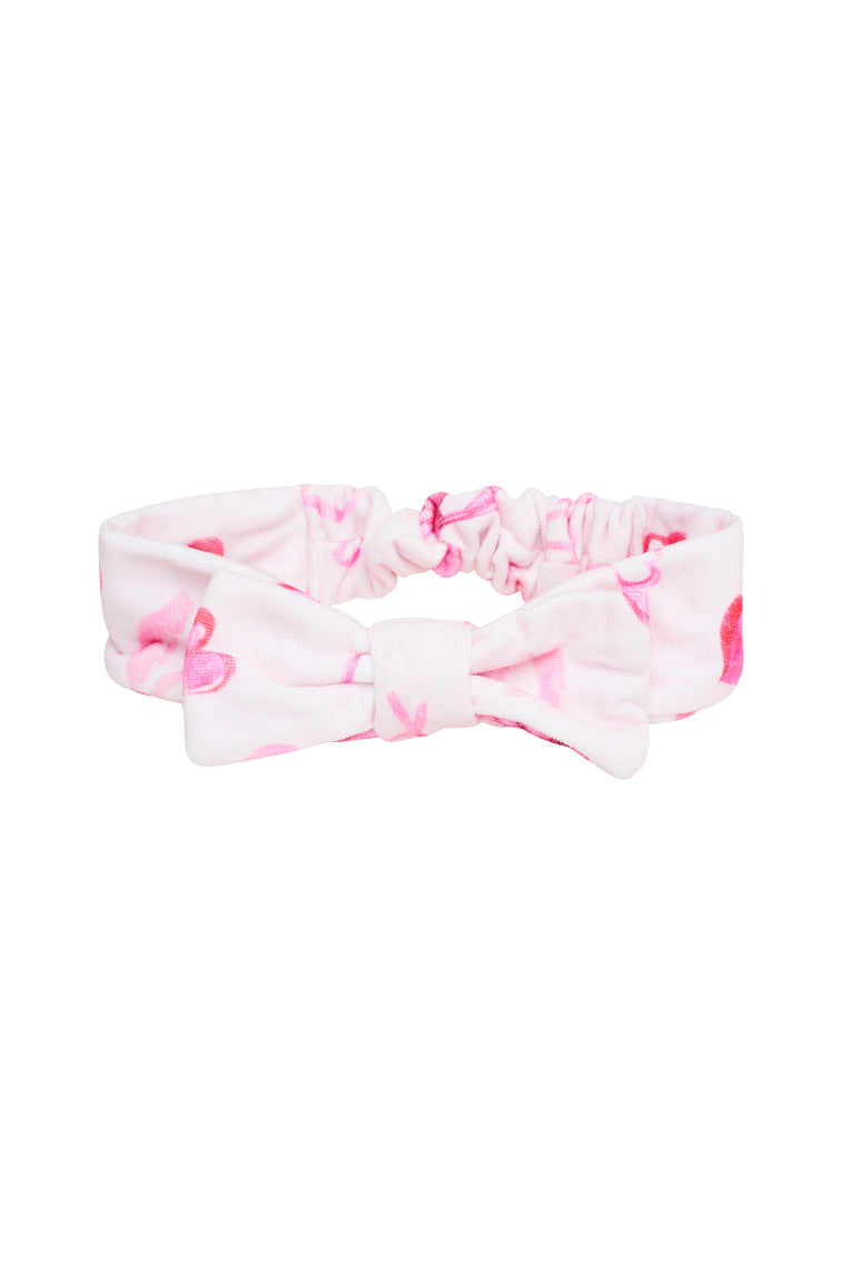 Light pink bow face wash headband with ribbon bow top, elastic band