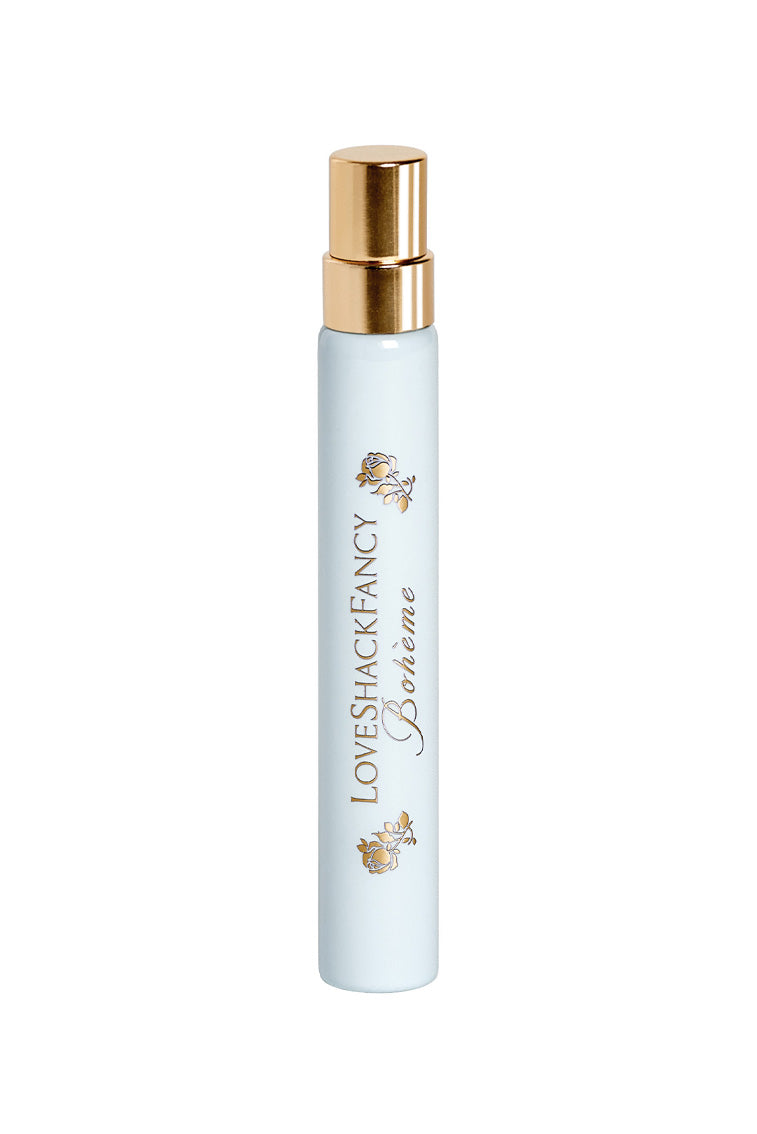 Light blue perfume travel spray bottle with gold cap and LoveShack Fancy label