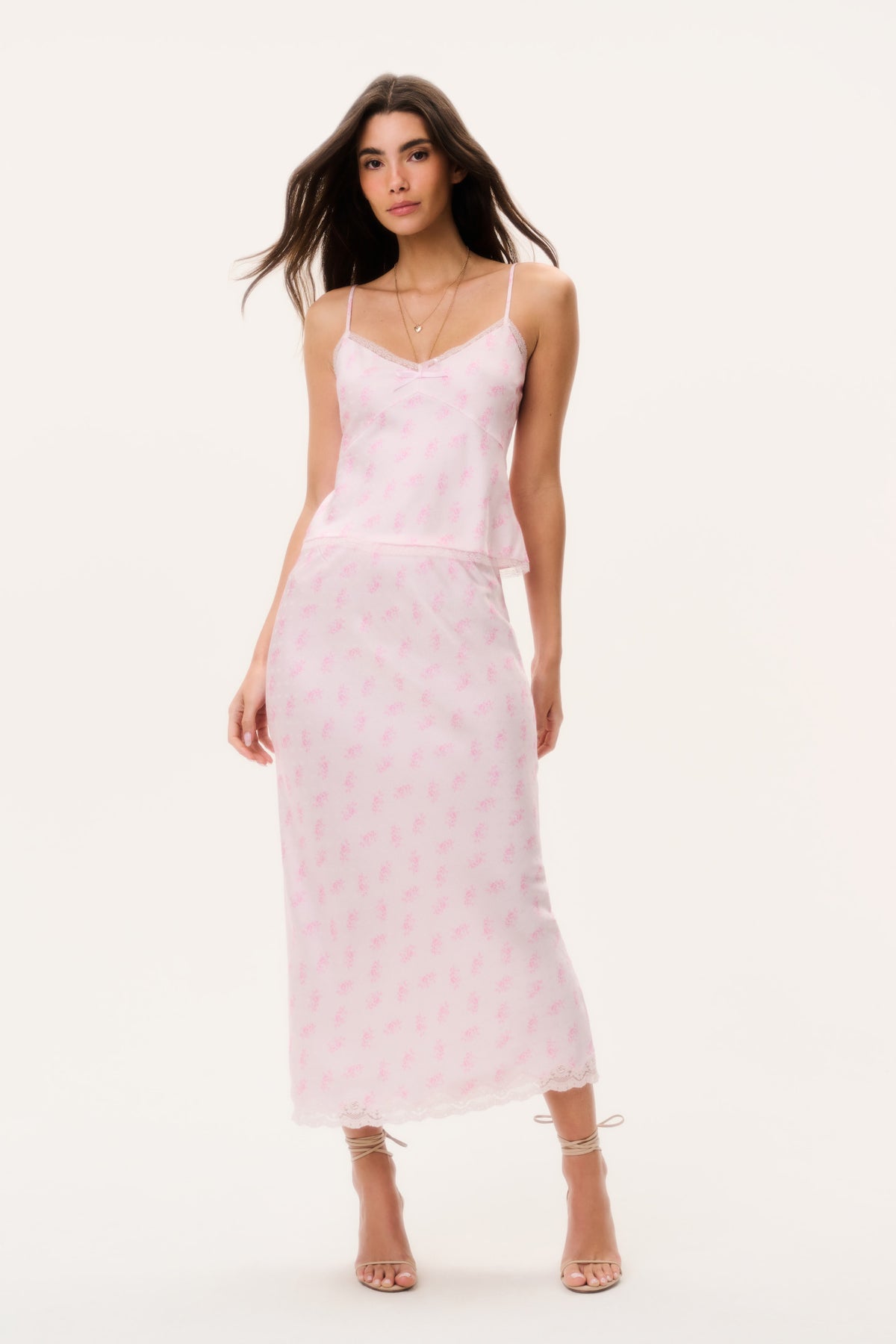 Castle silk-blend floral maxi skirt in blush pink with lace-trim hem, front view on model