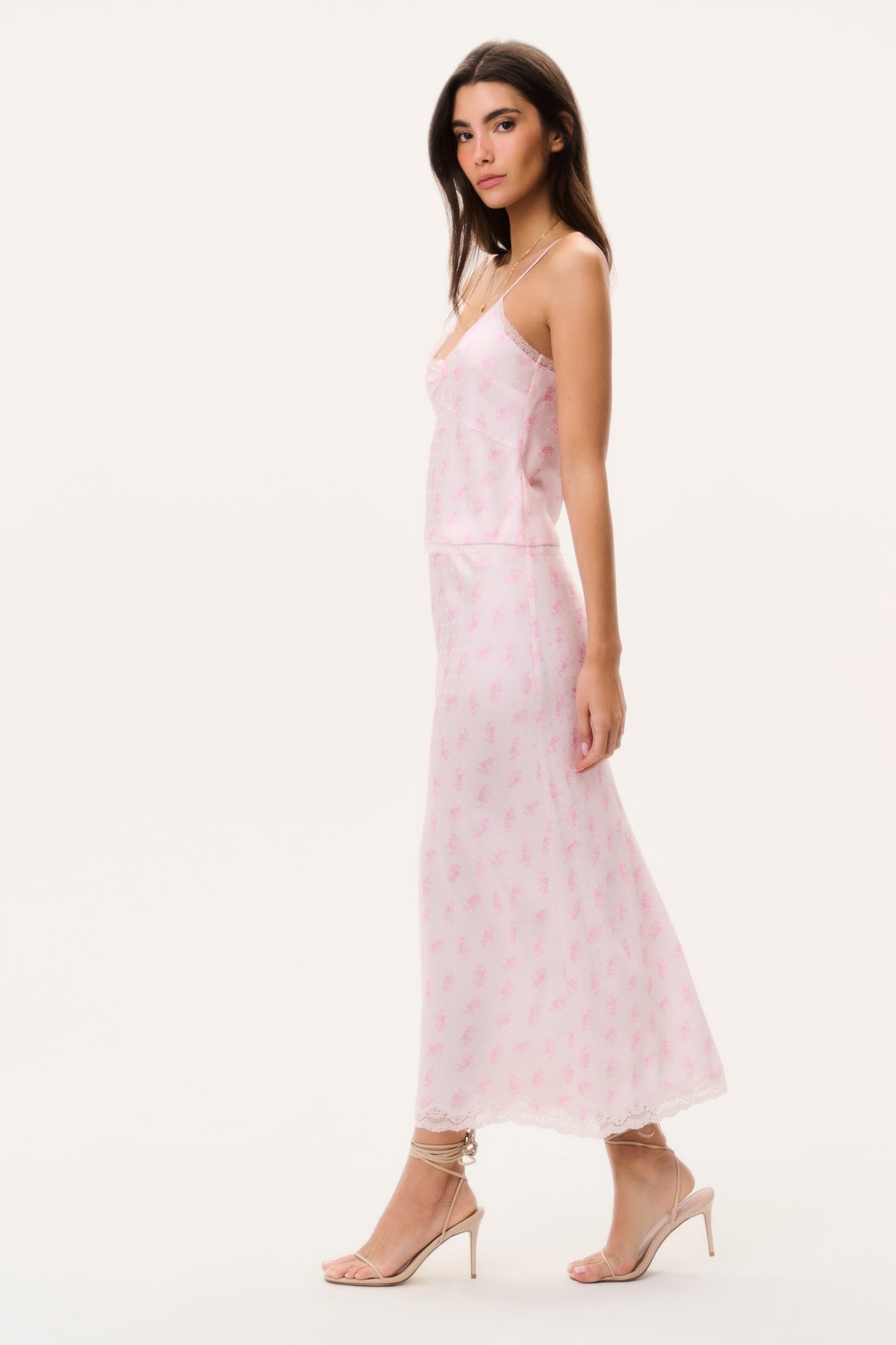Castle silk-blend floral maxi skirt in blush pink with lace-trim hem, angled view