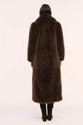 Dark brown long faux fur jacket, open back view with three-quarter sleeves