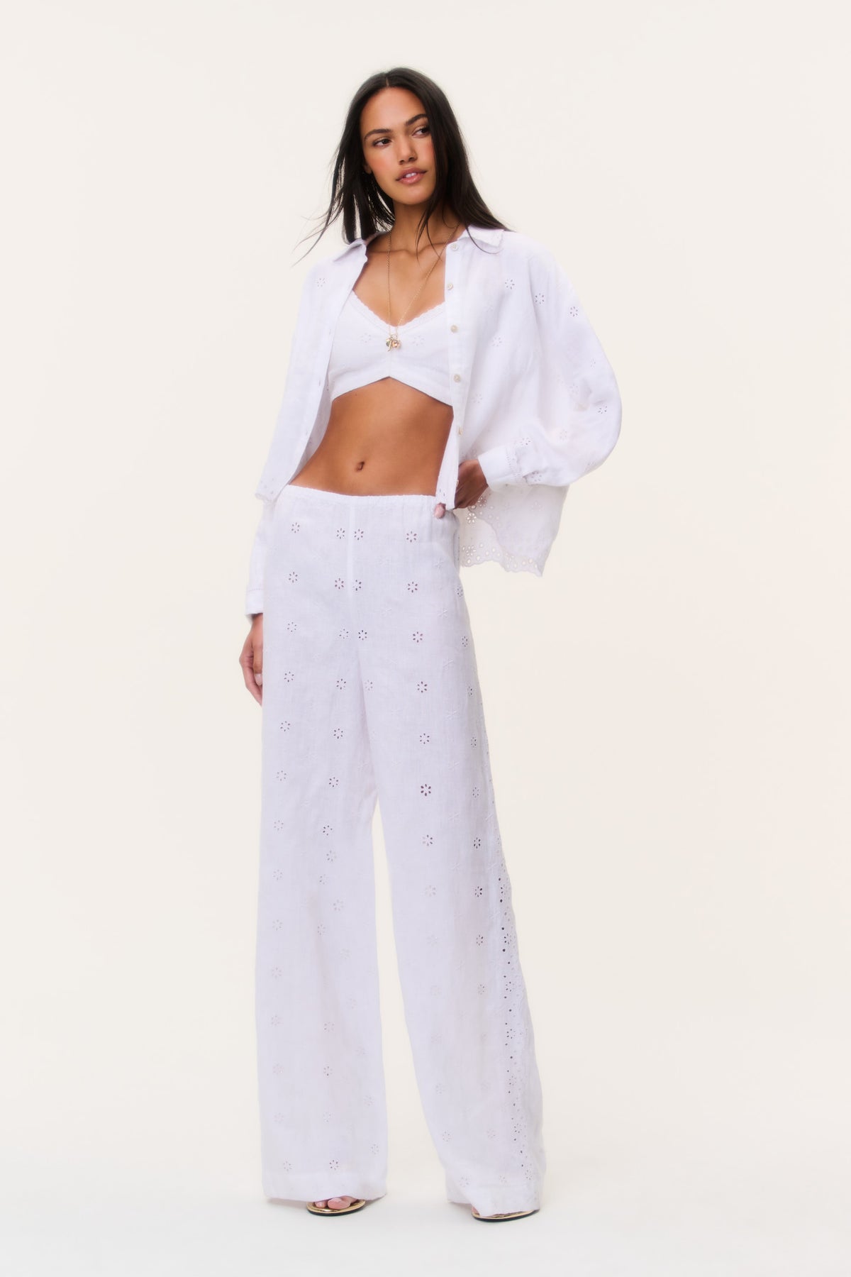 Light eyelet linen pants with high waist and straight wide legs, allover small eyelet motifs