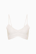 Optic white eyelet linen bralette with adjustable spaghetti straps