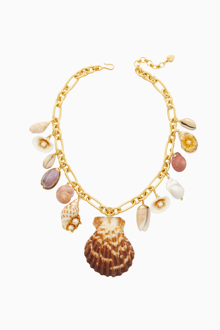 Gold beach-bound necklace, scallop and cowrie shell charms with purple beads