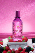 Berry Kiss perfume mist bottle, pink glitter look with purple cap