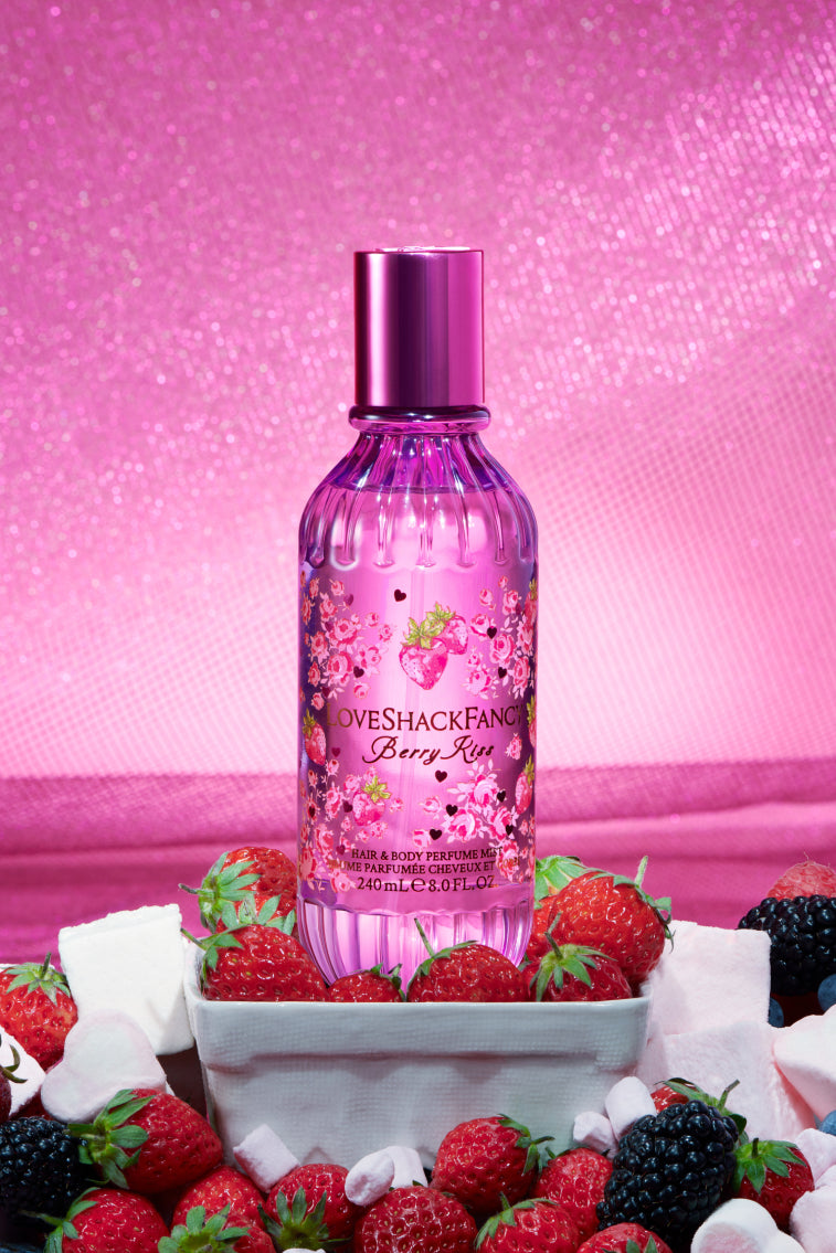 Berry Kiss perfume mist bottle, pink glitter look with purple cap
