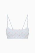 Light blue printed sports bra with wide band and thin adjustable straps