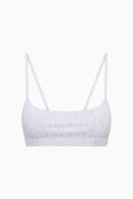 Light blue tennis-print sports bra with thin straps and scoop neckline