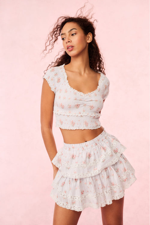 Cotton floral crop top with short puff sleeves and scalloped neckline