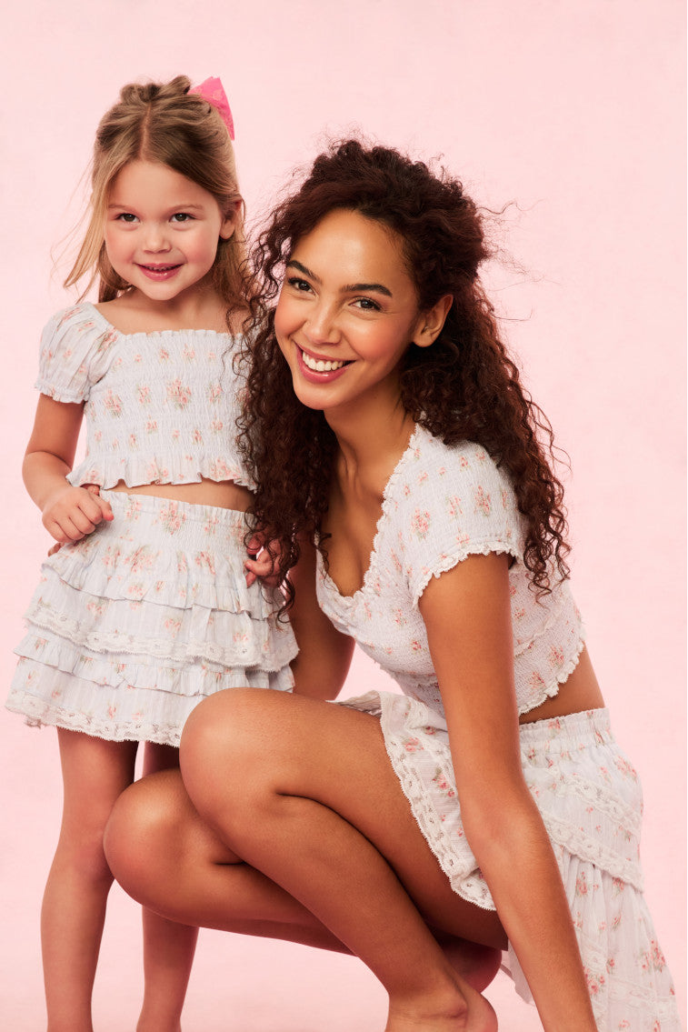 Cotton floral top with short puff sleeves, worn by mother and child