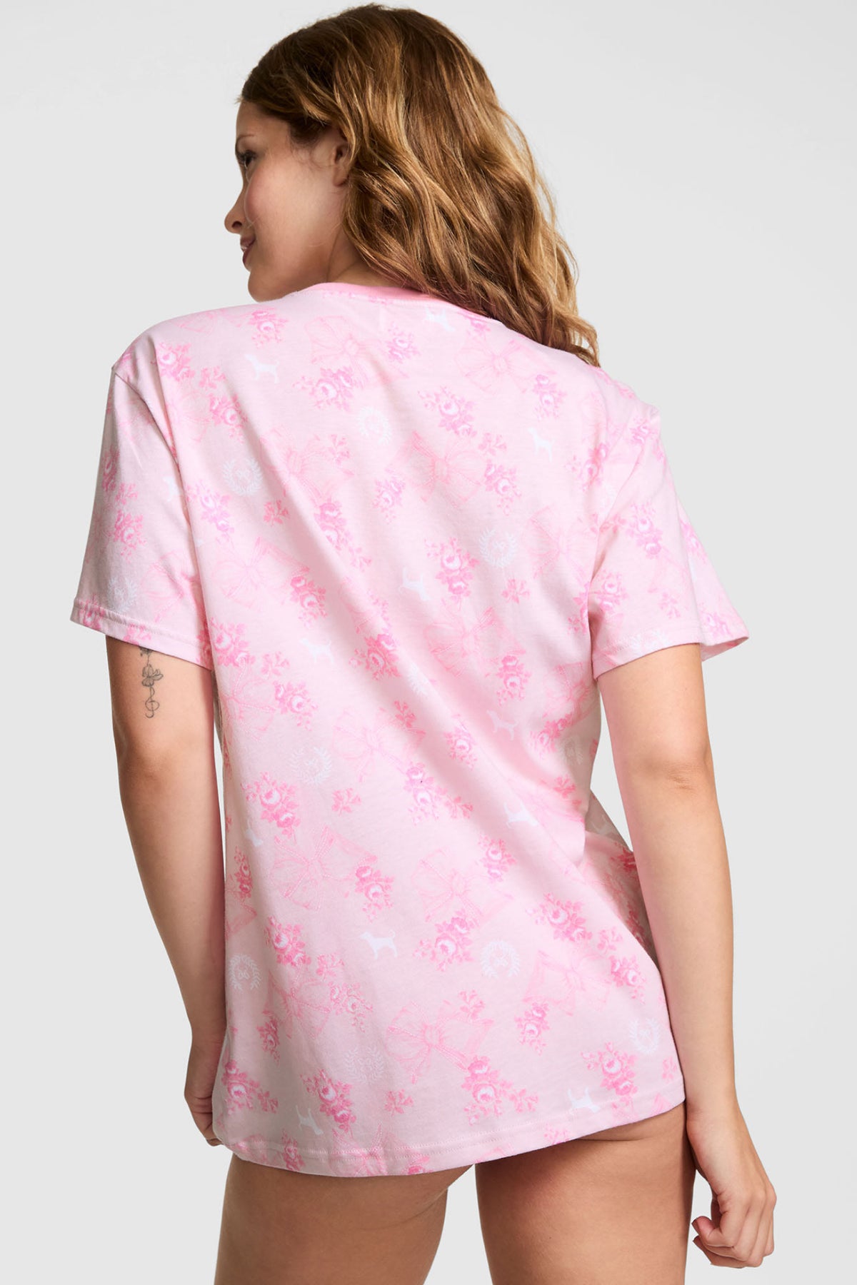Pink cotton campus tee with all-over print, shown from the back