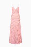 Light pink maxi dress on white background, spaghetti straps, V-neck, patterned skirt.