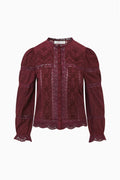 Burgundy Swiss dot blouse with button front, long sleeves, lace-trim cuffs