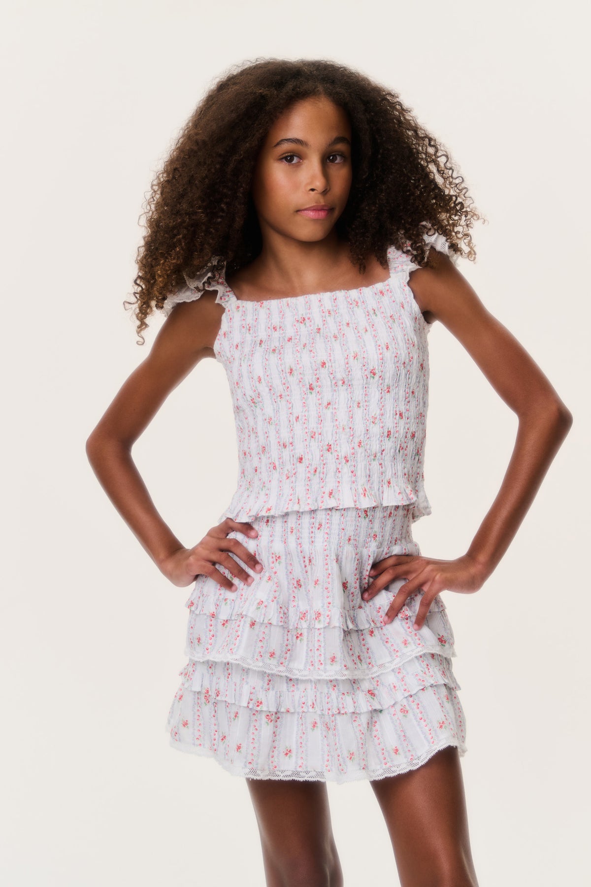 Tiered ruffle tween skirt with white base and red/pink stripe pattern