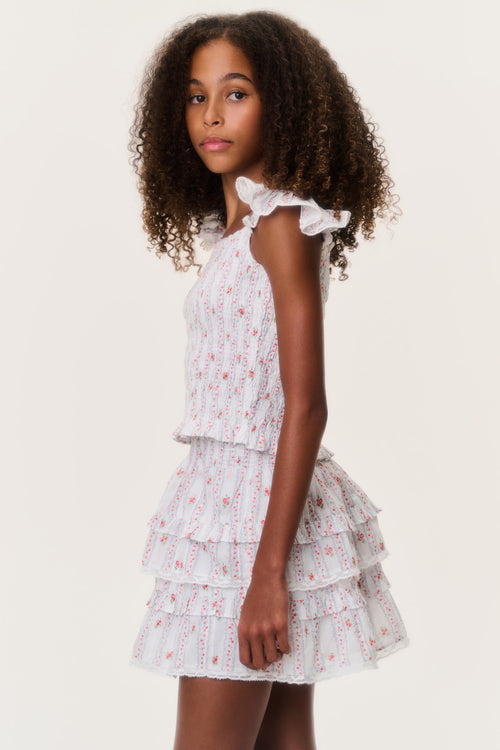 Side view of tiered ruffle tween skirt, white with red and pink stripe pattern