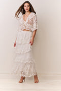 Ivory embroidered mesh tiered maxi skirt with delicate floral-like embroidery details