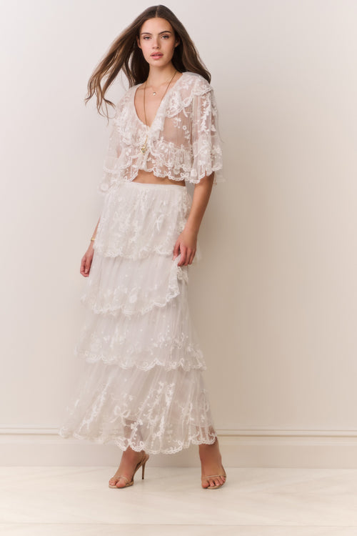 Ivory embroidered mesh tiered maxi skirt with delicate floral-like embroidery details