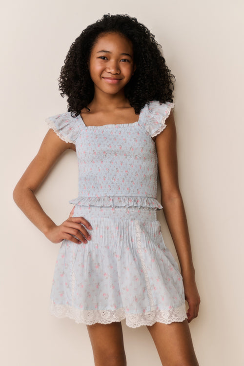 Ivory floral cotton skirt with lace-trim ruffle hem and tiered gathers, front view