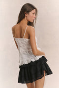Cotton cami top in bright white with lace back yoke and thin straps.