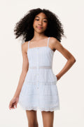 Blue tween mini dress front view with button detail and lace trim at hem