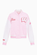 Pink collegiate varsity jacket with snap front and stitched team logo patches