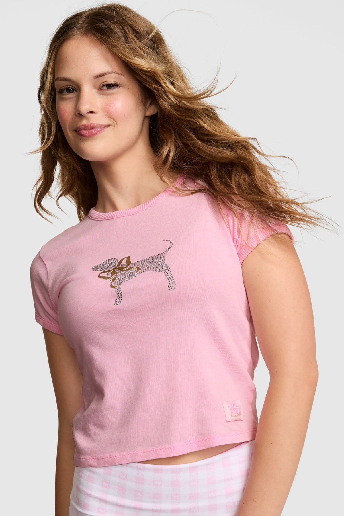 Pink cotton baby tee with unicorn graphic on crew neck