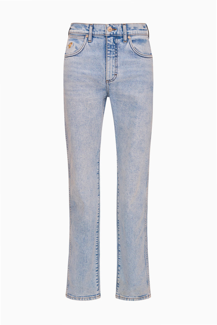 Light wash denim jeans with straight legs and visible front seam stitching
