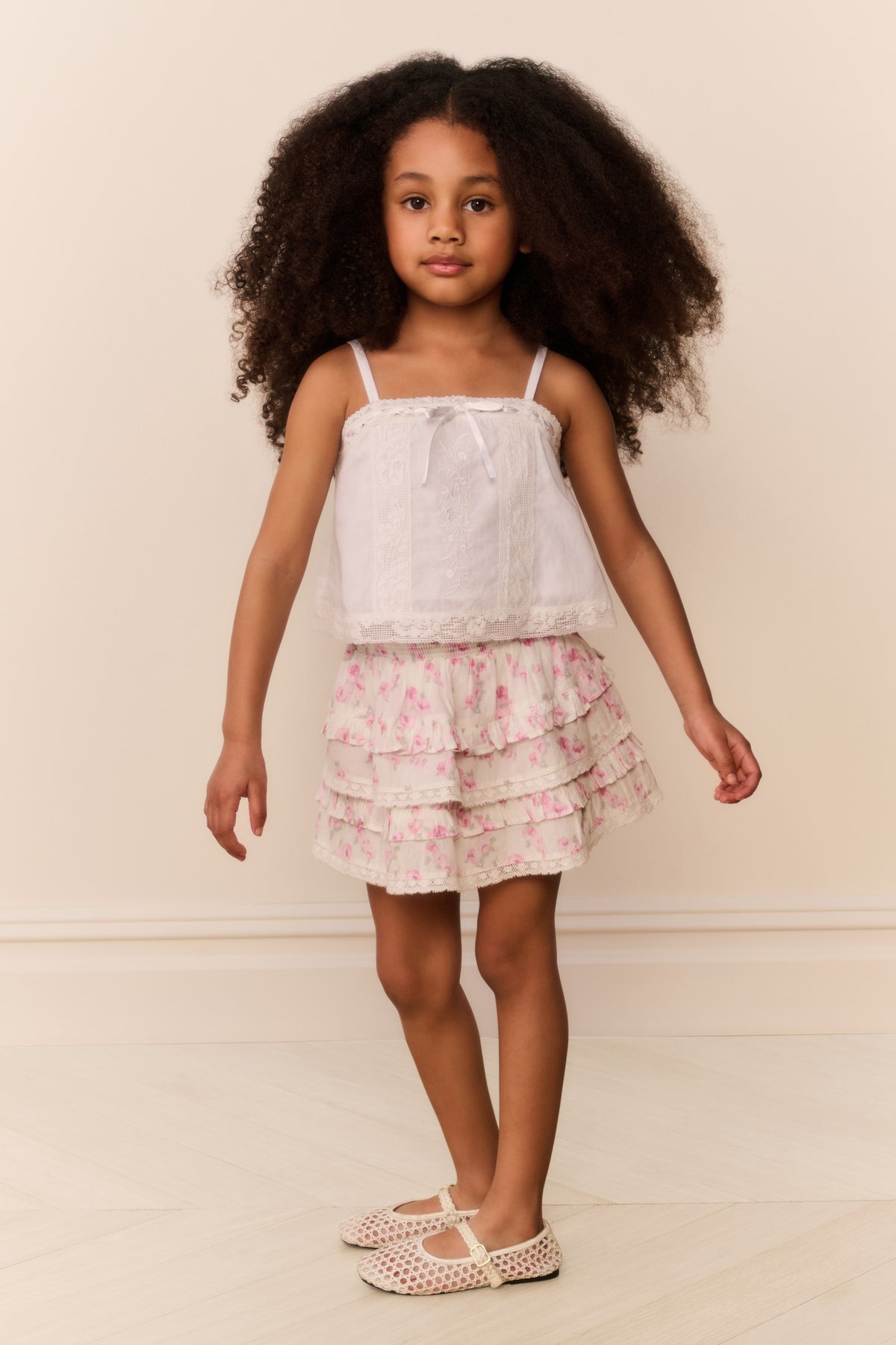 Girls floral tiered skirt with elastic waistband and layered ruffle tiers, pink/white