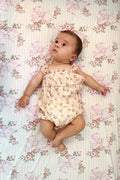 Cotton crib sheet with pink floral and butterfly stripe pattern