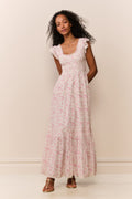 Pink floral maxi dress with flutter sleeves and tiered hem, front view